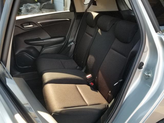 フィットハイブリッド Fパッケージ ナビ ワンセグ Bカメラ Bluetoothオーディオ ETC スマキー 禁煙車 フルフラット 横滑り防止 ABS 電格ミラー CD DVD再生 運転席エアバッグ 助手席エアバッグ エアコン(42枚目)