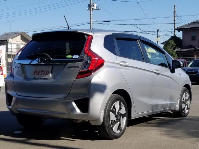 フィットハイブリッド Fパッケージ ナビ ワンセグ Bカメラ Bluetoothオーディオ ETC スマキー 禁煙車 フルフラット 横滑り防止 ABS 電格ミラー CD DVD再生 運転席エアバッグ 助手席エアバッグ エアコン(45枚目)