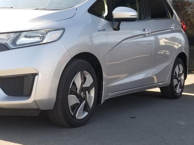 フィットハイブリッド Fパッケージ ナビ ワンセグ Bカメラ Bluetoothオーディオ ETC スマキー 禁煙車 フルフラット 横滑り防止 ABS 電格ミラー CD DVD再生 運転席エアバッグ 助手席エアバッグ エアコン(49枚目)