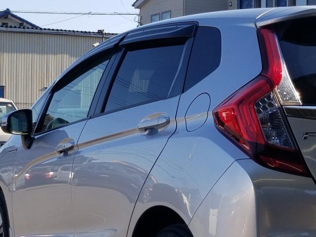 フィットハイブリッド Fパッケージ ナビ ワンセグ Bカメラ Bluetoothオーディオ ETC スマキー 禁煙車 フルフラット 横滑り防止 ABS 電格ミラー CD DVD再生 運転席エアバッグ 助手席エアバッグ エアコン(50枚目)