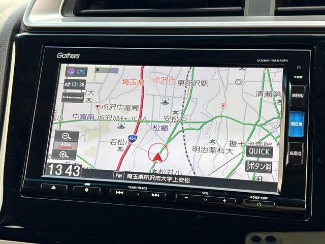 フィット 13G・F ナビ フルセグ Bカメラ Bluetoothオーディオ ETC Iストップ 14インチAW スマキー 禁煙車 フルフラット 横滑り防止 ABS 電格ミラー CD DVD再生(4枚目)