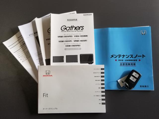 フィット 13G・F ナビ フルセグ Bカメラ Bluetoothオーディオ ETC Iストップ 14インチAW スマキー 禁煙車 フルフラット 横滑り防止 ABS 電格ミラー CD DVD再生(22枚目)