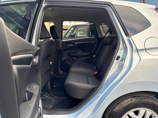 フィット 13G・F ナビ フルセグ Bカメラ Bluetoothオーディオ ETC Iストップ 14インチAW スマキー 禁煙車 フルフラット 横滑り防止 ABS 電格ミラー CD DVD再生(57枚目)