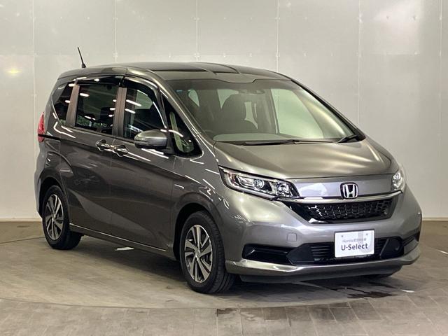 フリードハイブリッド ハイブリッド・Ｇホンダセンシング　ＥＴＣ　ナビ　前後ドライブレコーダー　シートヒーター　ＣＤ　ＤＶＤ　フルセグＴＶ　ＵＳＢ　Ｂｌｕｅｔｏｏｔｈ　軽減ブレーキ　キーフリーシステム　１オ－ナ－　記録簿　サイドカーテンエアバック　ＥＣＯＮ（3枚目）