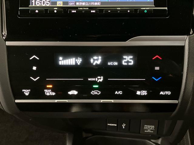 フィットハイブリッド ハイブリッド・モデューロスタイルホンダセンシング　ＥＴＣ　純正ナビ　前側ドライブレコーダー　前後パーキングセンサー　ＣＤ　ＤＶＤ　フルセグＴＶ　Ｂｌｕｅｔｏｏｔｈ　ＵＳＢ　ＬＥＤランプ　Ｒカメラ　クルコン　エアコン　イモビ　ＥＳＣ　衝突軽減ブレーキ（16枚目）