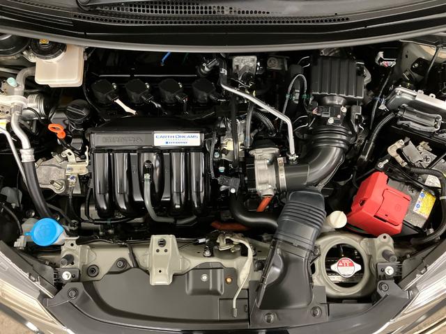 フィットハイブリッド ハイブリッド・モデューロスタイルホンダセンシング　ＥＴＣ　純正ナビ　前側ドライブレコーダー　前後パーキングセンサー　ＣＤ　ＤＶＤ　フルセグＴＶ　Ｂｌｕｅｔｏｏｔｈ　ＵＳＢ　ＬＥＤランプ　Ｒカメラ　クルコン　エアコン　イモビ　ＥＳＣ　衝突軽減ブレーキ（18枚目）