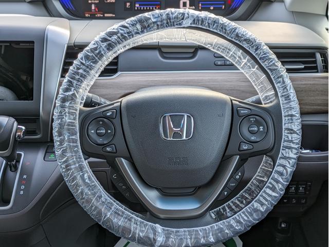 フリード Ｇ　Ｈｏｎｄａ　ＳＥＮＳＩＮＧ　登録済未使用車　禁煙車　衝突被害軽減ブレーキ　誤発進抑制装置　ｉ－ＳＴＯＰ　盗難防止　ダブルエアバック　ＡＡＣ　横滑り防止　ＡＢＳ　シ－トヒ－タ－　キーレス　パワーステアリング　衝突安全ボディ　スマキ（20枚目）