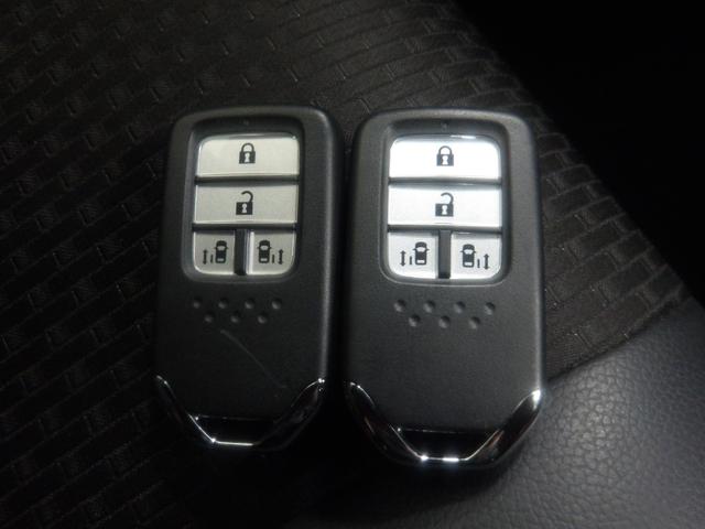 ステップワゴンスパーダ スパーダ・クールスピリット ホンダセンシング 禁煙車 ワンオーナー 後席モニター 10インチナビ 前後ドラレコ リアカメラ ETC2.0 シートヒーター 両側電動スライド ドアバイザー 後席オートAC CD/DVD再生 Bluetooth パドル(29枚目)