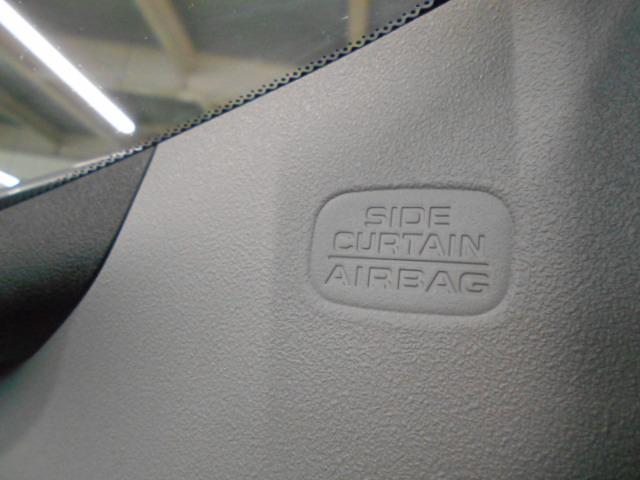 フィット e:HEVRS 弊社元試乗車 禁煙 9INナビ リアカメラ 前4ドライブレコーダー サイドカーテンエアバッグ Bluetoothオーディオ接続 フルセグTV CD DVD ミュージックラック ETC アルミホイール(6枚目)