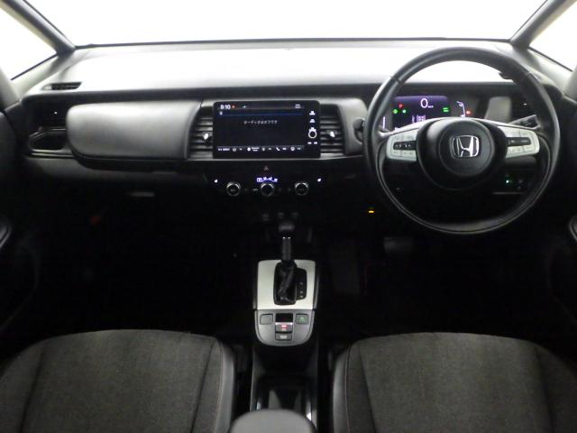 フィット e:HEVホーム20周年特別仕様車カーサ 禁煙 ワンオーナー ホンダインターナビ リアカメラ 前後ドラレコ 前席シートヒーター サイドカーテンエアバッグ パーキングセンサー ETC2.0 オールシーズンタイヤ LEDヘッドライト フルセグ(14枚目)