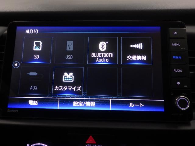 フィット ｅ：ＨＥＶホーム　元当社試乗車　禁煙　前ドライブレコーダー　ホンダコネクト９インチナビ　リアカメラ　前ドライブレコーダー　サイドカーテンエアバッグ　ＥＴＣ　Ｂｌｕｅｔｏｏｔｈ接続　ＣＤ　ＤＶＤ　ミュージックラック（4枚目）