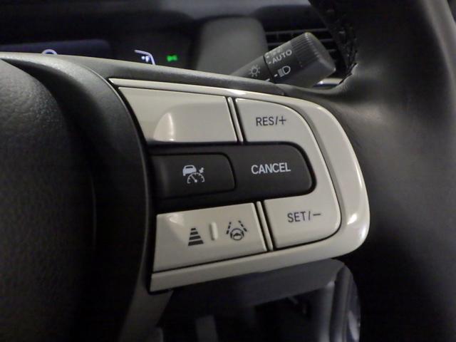 フィット ｅ：ＨＥＶホーム　元当社試乗車　禁煙　前ドライブレコーダー　ホンダコネクト９インチナビ　リアカメラ　前ドライブレコーダー　サイドカーテンエアバッグ　ＥＴＣ　Ｂｌｕｅｔｏｏｔｈ接続　ＣＤ　ＤＶＤ　ミュージックラック（12枚目）