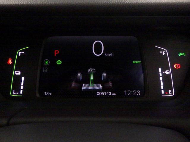 フィット ｅ：ＨＥＶホーム　元当社試乗車　禁煙　前ドライブレコーダー　ホンダコネクト９インチナビ　リアカメラ　前ドライブレコーダー　サイドカーテンエアバッグ　ＥＴＣ　Ｂｌｕｅｔｏｏｔｈ接続　ＣＤ　ＤＶＤ　ミュージックラック（15枚目）