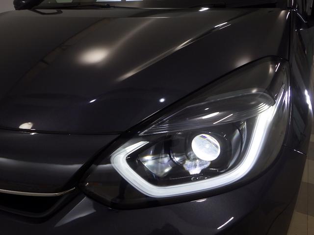 フィット ｅ：ＨＥＶホーム　元当社試乗車　禁煙　前ドライブレコーダー　ホンダコネクト９インチナビ　リアカメラ　前ドライブレコーダー　サイドカーテンエアバッグ　ＥＴＣ　Ｂｌｕｅｔｏｏｔｈ接続　ＣＤ　ＤＶＤ　ミュージックラック（27枚目）