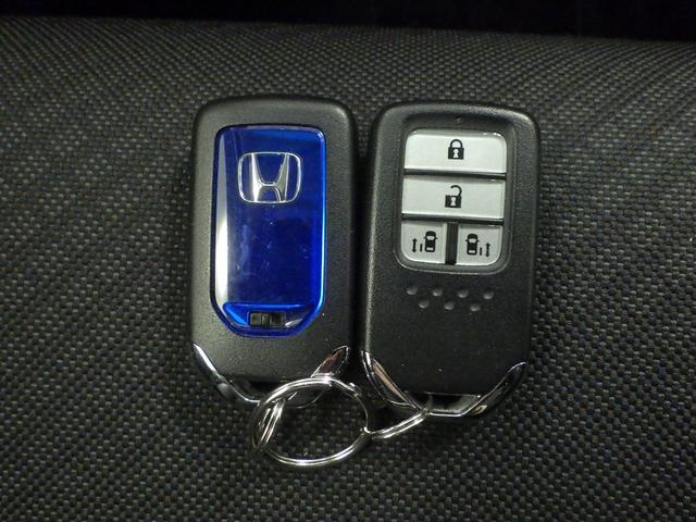 フリードハイブリッド ハイブリッド・Gホンダセンシング 禁煙 ワンオーナー 11IN天井モニター 前後ドラレコ 9INナビ リアカメラ 両側電動スライドドア 前席シートヒーター Bluetooth接続 CD DVD フルセグTV USB LEDライト(16枚目)