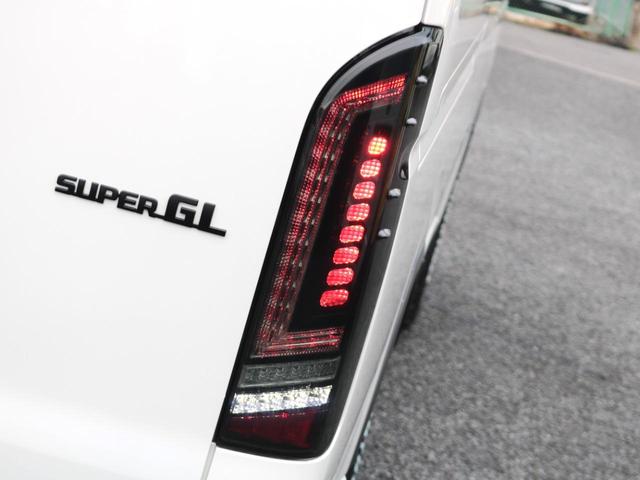 ハイエースバン スーパーＧＬ　ダークプライムＩＩ　ディーゼル４ＷＤＴＲＤバンパーガードマットブラック施工プレステージＬＥＤテールＲｅクラシック専用グリルオーバーフェンダーＮＴ－１１６インチＡＷオープンカントリータイヤタイプ２ベッドキットサイドバー（31枚目）