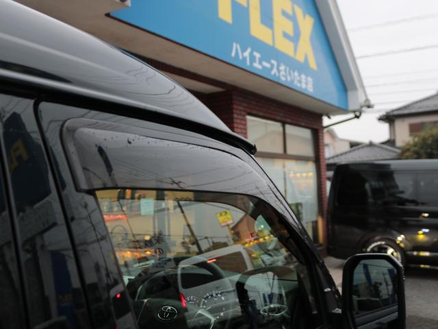 ハイエースワゴン GL ロング 【買取直販】オットマン付きキャプテンシート4脚 ファインテックツアラー BIG-X11インチナビ 12.8インチフリップダウンモニター HDMIスマホミラーリング対応 デジタルインナーミラー PVM(27枚目)