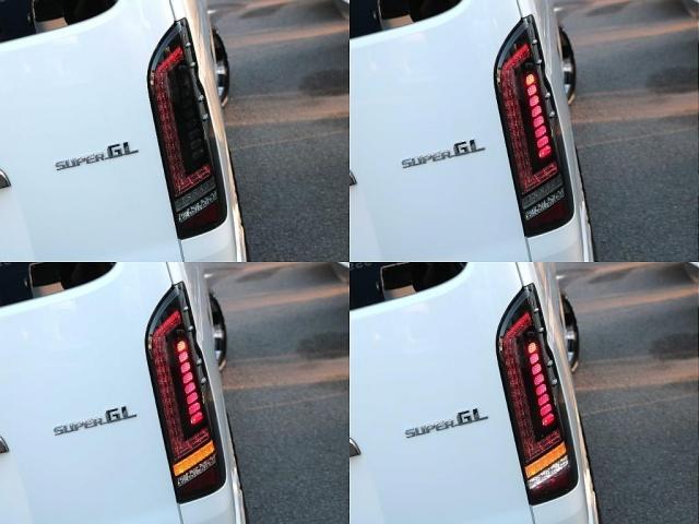 ハイエースバン スーパーＧＬ　ダークプライムＩＩ　ディーゼル４ＷＤ床張り跳ね上げベット　純正フルセグナビ　カロッツェリアツイーター　スモークフィルム　ＴＲＤフロントスポイラー　ＴＲＤサイドスカート　ＴＲＤリアバンパースポイラー　ＴＲＤスカッフプレート（17枚目）