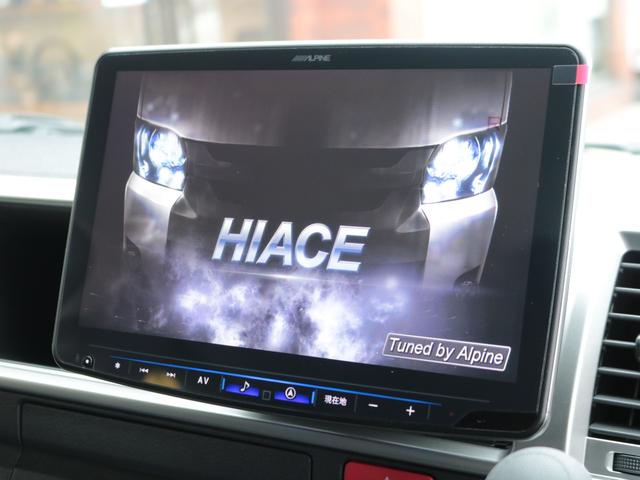 ハイエースワゴン GL ロング FLEX内装アレンジ【familiar】ベット&テーブル車中泊仕様 BIG-X11インチナビ HDMIスマホミラーリング フローリングフロア デジタルインナーミラー パノラミックビューモニター TSS(48枚目)