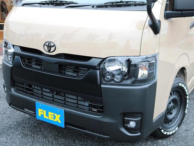 ハイエースバン ロングスーパーGL 登録済未使用車 アースカラーパッケージ メカレスBIG-X11インチナビ HDMIスマホミラーリング ブラックエディション 黒革調シートカバー デジタルインナーミラー PVM 小窓付きスライドガラス(9枚目)