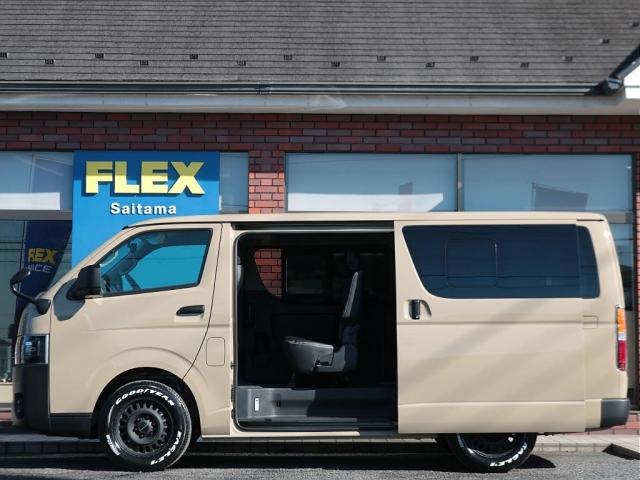 ハイエースバン ロングスーパーGL 登録済未使用車 アースカラーパッケージ メカレスBIG-X11インチナビ HDMIスマホミラーリング ブラックエディション 黒革調シートカバー デジタルインナーミラー PVM 小窓付きスライドガラス(14枚目)