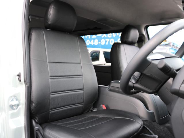 ハイエースバン ロングスーパーGL 登録済未使用車 アースカラーパッケージ メカレスBIG-X11インチナビ HDMIスマホミラーリング ブラックエディション 黒革調シートカバー デジタルインナーミラー PVM 小窓付きスライドガラス(42枚目)