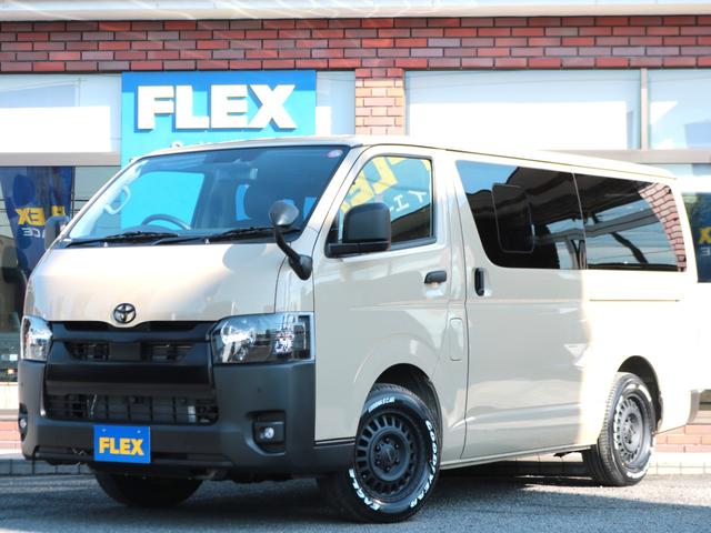 ハイエースバン ロングスーパーGL 登録済未使用車 アースカラーパッケージ メカレスBIG-X11インチナビ HDMIスマホミラーリング ブラックエディション 黒革調シートカバー デジタルインナーミラー PVM 小窓付きスライドガラス(50枚目)