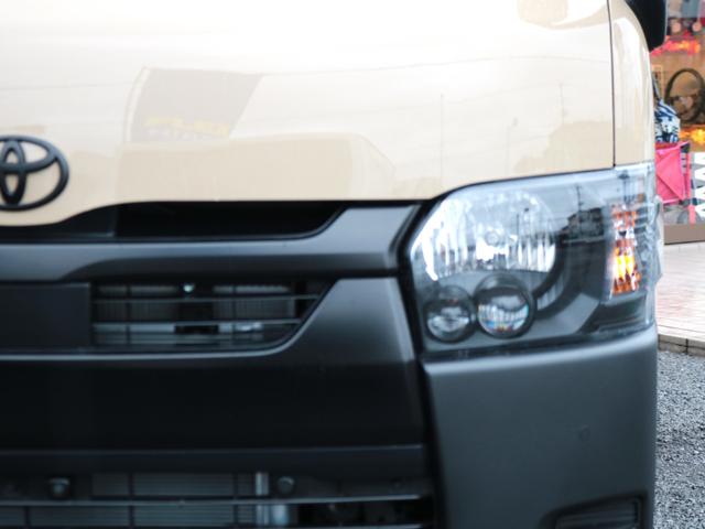 ハイエースバン ロングスーパーGL 登録済未使用車 アースカラーパッケージ メカレスBIG-X11インチナビ HDMIスマホミラーリング ブラックエディション 黒革調シートカバー デジタルインナーミラー PVM 小窓付きスライドガラス(54枚目)