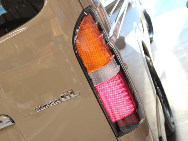 ハイエースバン ロングスーパーGL 登録済未使用車 アースカラーパッケージ メカレスBIG-X11インチナビ HDMIスマホミラーリング ブラックエディション 黒革調シートカバー デジタルインナーミラー PVM 小窓付きスライドガラス(60枚目)