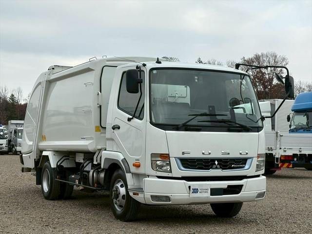 ファイター 塵芥車 プレス式 8.7立米 連続スイッチ 新明和GT084ー5734WP 6MT 170ps 積載1.8t(4枚目)