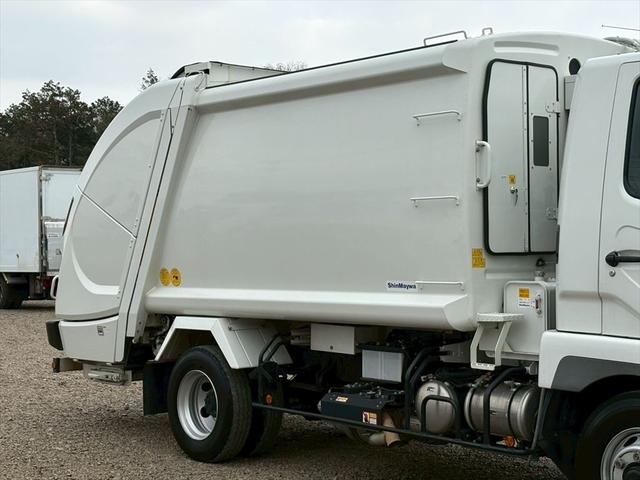 ファイター 塵芥車 プレス式 8.7立米 連続スイッチ 新明和GT084ー5734WP 6MT 170ps 積載1.8t(7枚目)