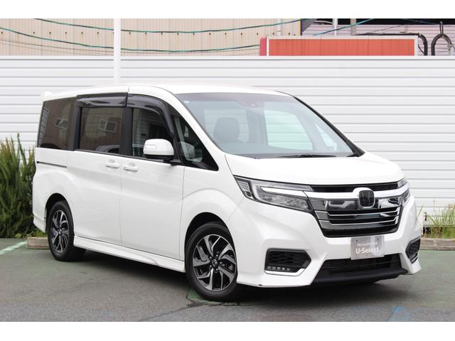 ステップワゴンスパーダ スパーダホンダセンシング　ＥＴＣ２．０　ＨｏｎｄａＳＥＮＳＩＮＧ　わくわくゲート　１６インチアルミ　ＦＡＢＴＥＣＴ撥水撥油シート大画面ナビ　バックカメラ　パドルシフト　スマートキー　７人乗り　フォグライト　両側電動スライド（5枚目）