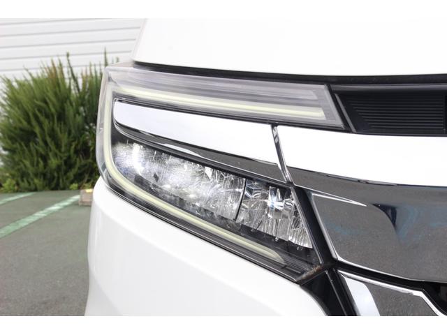 ステップワゴンスパーダ スパーダホンダセンシング　ＥＴＣ２．０　ＨｏｎｄａＳＥＮＳＩＮＧ　わくわくゲート　１６インチアルミ　ＦＡＢＴＥＣＴ撥水撥油シート大画面ナビ　バックカメラ　パドルシフト　スマートキー　７人乗り　フォグライト　両側電動スライド（8枚目）
