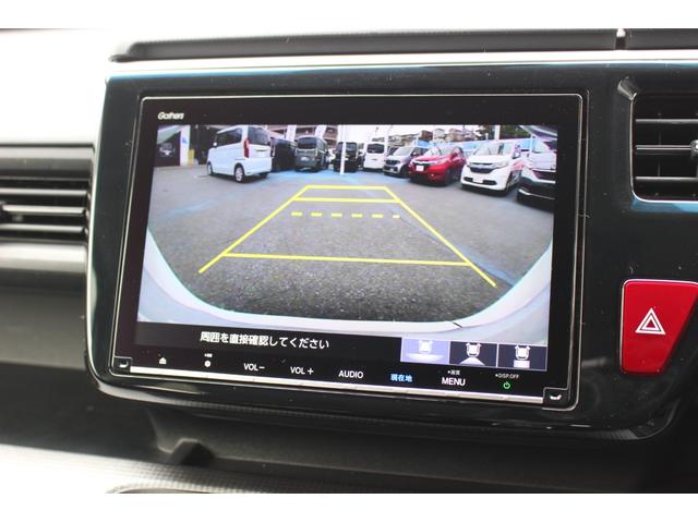 ステップワゴンスパーダ スパーダホンダセンシング　ＥＴＣ２．０　ＨｏｎｄａＳＥＮＳＩＮＧ　わくわくゲート　１６インチアルミ　ＦＡＢＴＥＣＴ撥水撥油シート大画面ナビ　バックカメラ　パドルシフト　スマートキー　７人乗り　フォグライト　両側電動スライド（15枚目）