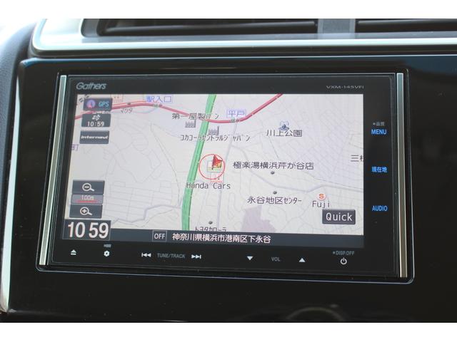 フィット 13G・Sパッケージ 1オーナー 純正ナビ 社外前後ドラレコ RS大型テールゲートスポイラー LEDライト Bluetoothオーディオ DVD再生可 キーレス フルセグテレビ ナビ&TV オートエアコン Wエアバック(4枚目)