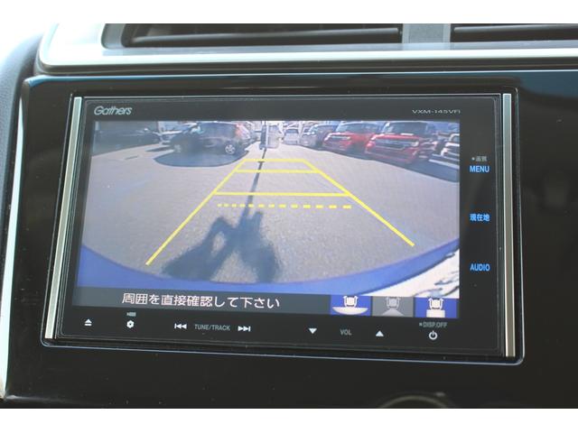 フィット 13G・Sパッケージ 1オーナー 純正ナビ 社外前後ドラレコ RS大型テールゲートスポイラー LEDライト Bluetoothオーディオ DVD再生可 キーレス フルセグテレビ ナビ&TV オートエアコン Wエアバック(5枚目)