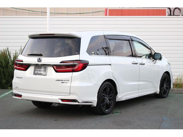 オデッセイハイブリッド ｅ：ＨＥＶアブソルート・ＥＸ　ＥＴＣ２．０　マルチビューカメラ　ブラインドスポットインフォメーション　運転席助手席シートヒーター　ＡＣ電源１５００Ｗ　パワーテールゲート　１８インチアルミ　前後ドラレコ　ナビ　両側電動スライドドア（6枚目）