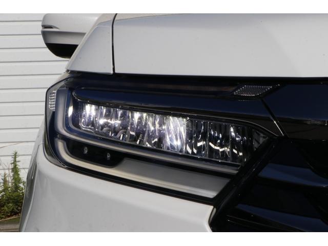 オデッセイハイブリッド ｅ：ＨＥＶアブソルート・ＥＸ　ＥＴＣ２．０　マルチビューカメラ　ブラインドスポットインフォメーション　運転席助手席シートヒーター　ＡＣ電源１５００Ｗ　パワーテールゲート　１８インチアルミ　前後ドラレコ　ナビ　両側電動スライドドア（8枚目）