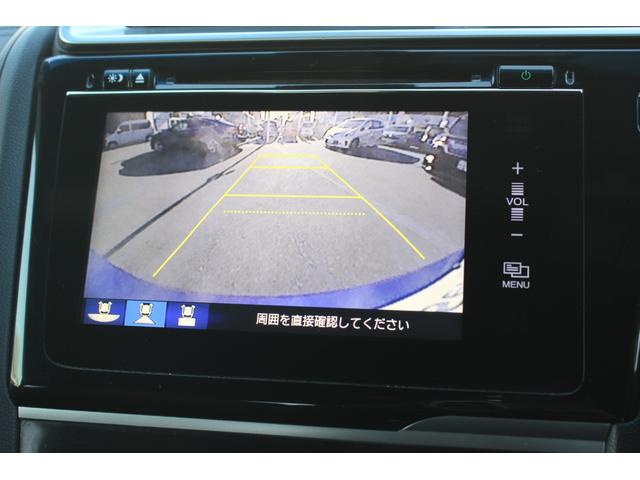 フィットハイブリッド Ｓパッケージ　１オーナー　純正ナビ　Ｂカメラ　ＲＳ大型リヤスポイラー　フォグライト　あんしんパッケージ　禁煙　点検記録簿　サイドエアバック　ワンセグテレビ　リアカメラ　ＵＳＢ　ＶＳＡ　クルコン　イモビライザー（5枚目）