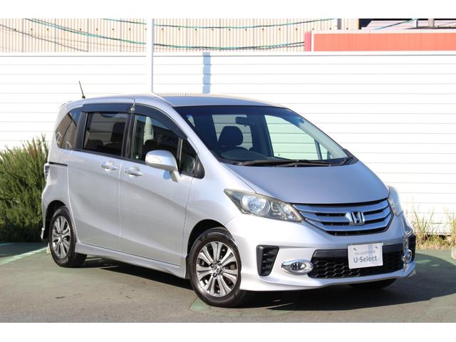 フリード Ｇエアロ　ＥＴＣ　ＨＩＤ　スマートキーシステム　イモビライザー　純正１５インチアルミ　左側電動スライドドア　ギャザズ純正ナビゲーション　ドアバイザー　フロアカーペット　フォグライト　助手席エアバッグ　盗難防止（4枚目）