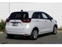 フィット ホーム 当社元試乗車 ETC HondaSENSING LEDヘッドライト CONNECTナビ 前後ドラレコバックカメラ ドアバイザー スマートキー フロアカーペット 電子制御パーキング アダプティブクルコン(6枚目)