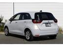 フィット ホーム 当社元試乗車 ETC HondaSENSING LEDヘッドライト CONNECTナビ 前後ドラレコバックカメラ ドアバイザー スマートキー フロアカーペット 電子制御パーキング アダプティブクルコン(7枚目)