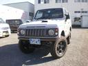 ジムニー ワイルドウインド 全塗装済 オートマ車 社外前後バンパー LEDヘッドライト 2.5インチリフトアップ ブラウンレザー調シートカバー ウッドハンドル ETC 中古車画像_2