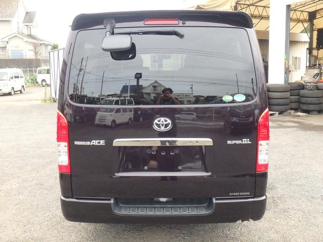 レジアスエースバン スーパーＧＬ　ダークプライムＩＩ　５型　軽油　２８００ｃｃターボ　２ＷＤ　６速ＡＴ　ＴＳＳ無し　ＶＳＣ＆ＴＲＣ　ＬＥＤヘッドライト　ＳＤナビＴＶ　バックカメラ　ＥＴＣ２．０　ＡＣ１００Ｖ電源　Ｗエアバック　純正アルミ　スマートキー２個（31枚目）