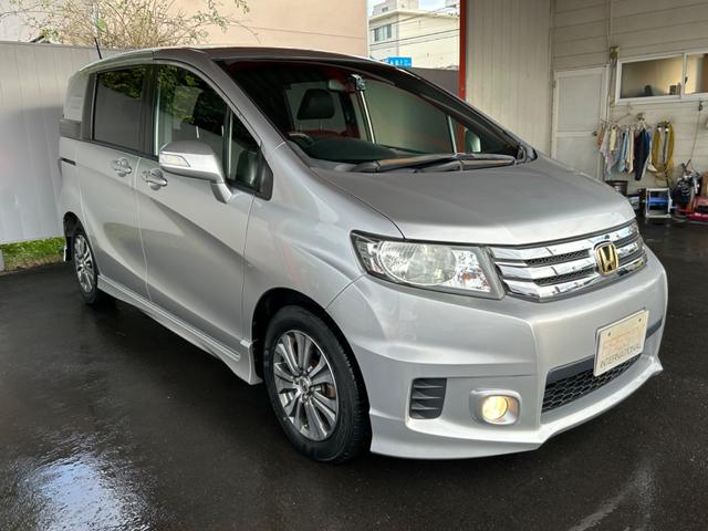 フリードスパイク Ｇ　エアロ　５人乗り　禁煙車　両側パワースライドドア　ナビ　ドラレコ　純正１５インチアルミホイール　クルーズコントロール　スマートキー　ＨＩＤヘッドライト　オートライト　ＥＴＣ（50枚目）