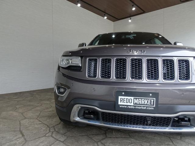 ジープ・グランドチェロキー リミテッド　禁煙車／記録簿／本革／ナビ地デジ／Ｂｌｕｅｔｏｏｔｈ／Ｆ＆Ｓ＆Ｂカメラ／ドラレコ／ＨＩＤ／ＥＴＣ／スマートキー／クルコン／ヒートヒーター＆クーラー／パドルシフト／パワーゲート／サイドステップ／１８ＡＷ（7枚目）