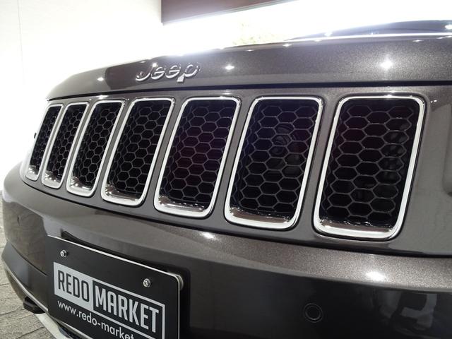 ジープ・グランドチェロキー リミテッド　禁煙車／記録簿／本革／ナビ地デジ／Ｂｌｕｅｔｏｏｔｈ／Ｆ＆Ｓ＆Ｂカメラ／ドラレコ／ＨＩＤ／ＥＴＣ／スマートキー／クルコン／ヒートヒーター＆クーラー／パドルシフト／パワーゲート／サイドステップ／１８ＡＷ（66枚目）