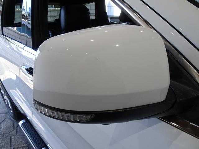 ジープ・グランドチェロキー リミテッド 禁煙車/記録簿/本革/サンルーフ/ナビ地デジ/Bluetooth/Bカメラ/HID/ETC/スマートキー/スペアキー/クルコン/パドルシフト/パワーゲート/サイドステップ/ルーフレール/オートライト/(59枚目)