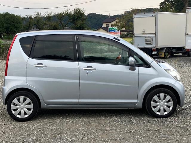 メモリアルエディション スマートキー 電動格納ミラー ベンチシート CVT 盗難防止システム ABS CD 衝突安全ボディ エアコン パワステ パワーウィンドウ 運転席・助手席エアバッグ フルフラット(14枚目)