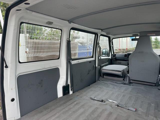 ミニキャブバン ＣＤ　切替４ＷＤ　法人１オーナー　記録簿　積載量３５０ｋｇ　集中ドアロック　４人乗り　軽貨物　軽バン　フルフラットシート　４ナンバー　エアコン　パワステ　ＡＭ・ＦＭラジオ　ＡＢＳ　Ｗエアバッグ（28枚目）